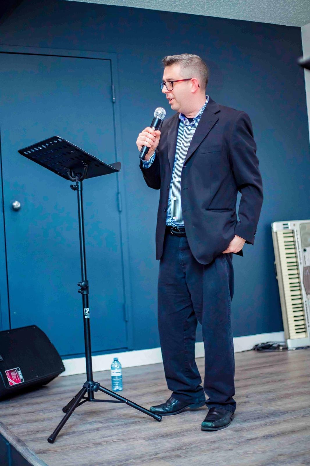 A guest speaker addressing the room at a Hope Ineza Foundation event